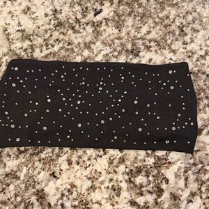 Headband with embellishments.